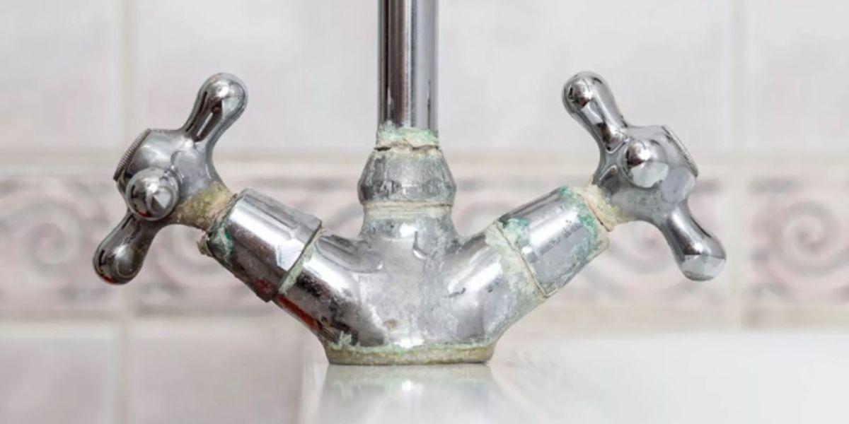 How to remove limescale from faucets